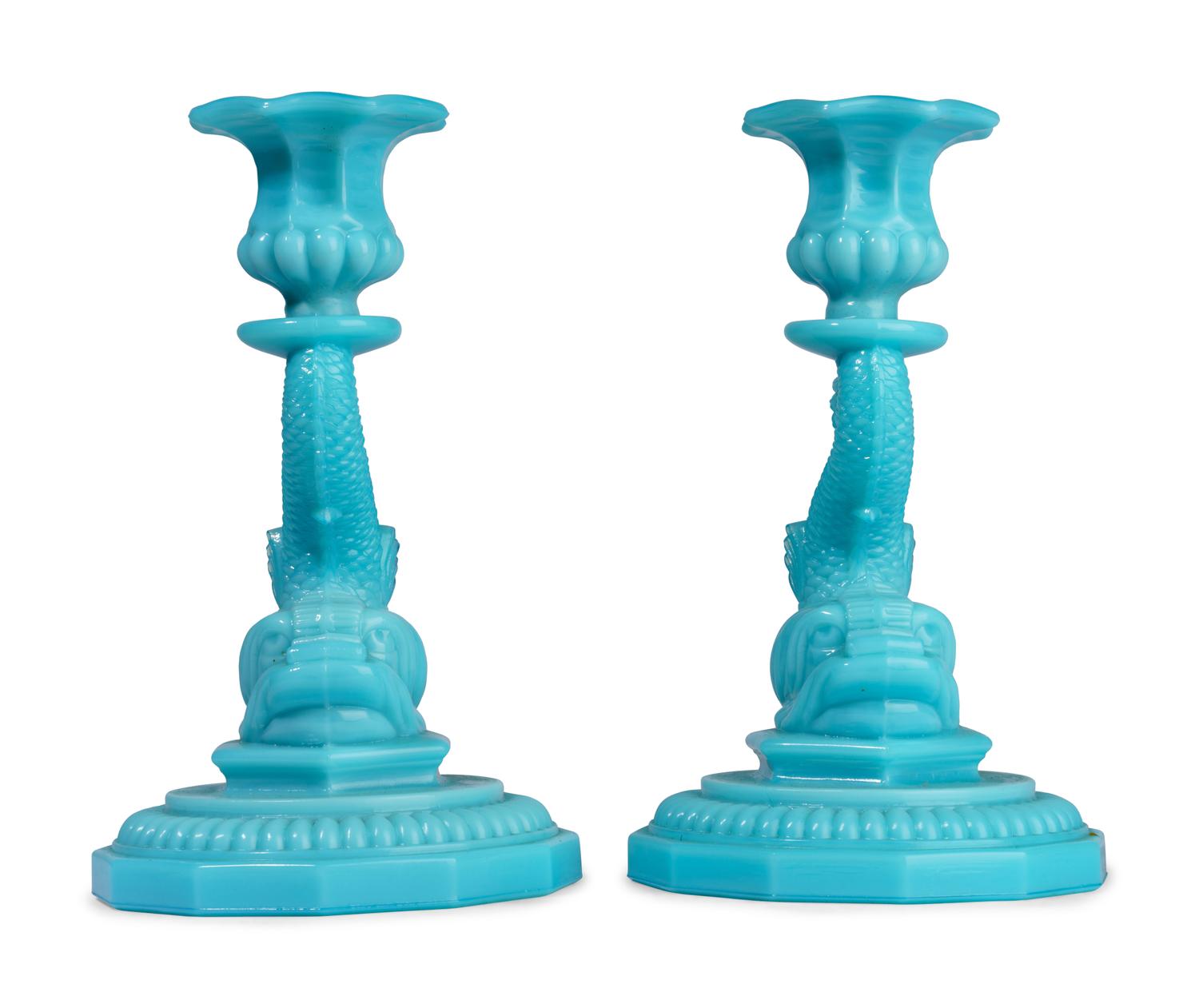 A Pair of Glass Dolphin Candlesticks