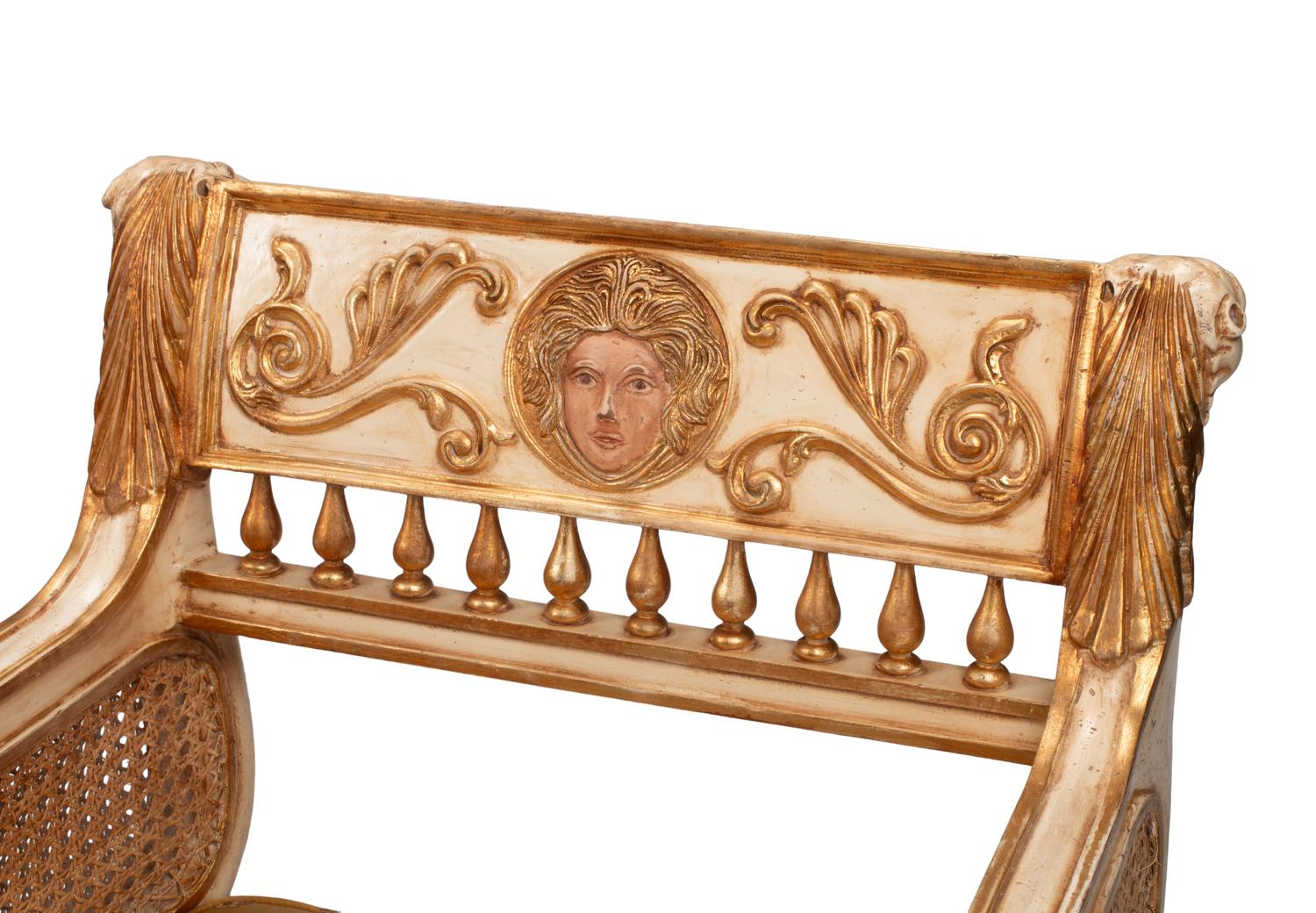 A Pair of Italian Neoclassical Style Painted and Parcel-Gilt Armchairs