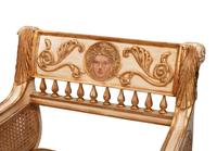 A Pair of Italian Neoclassical Style Painted and Parcel-Gilt Armchairs
