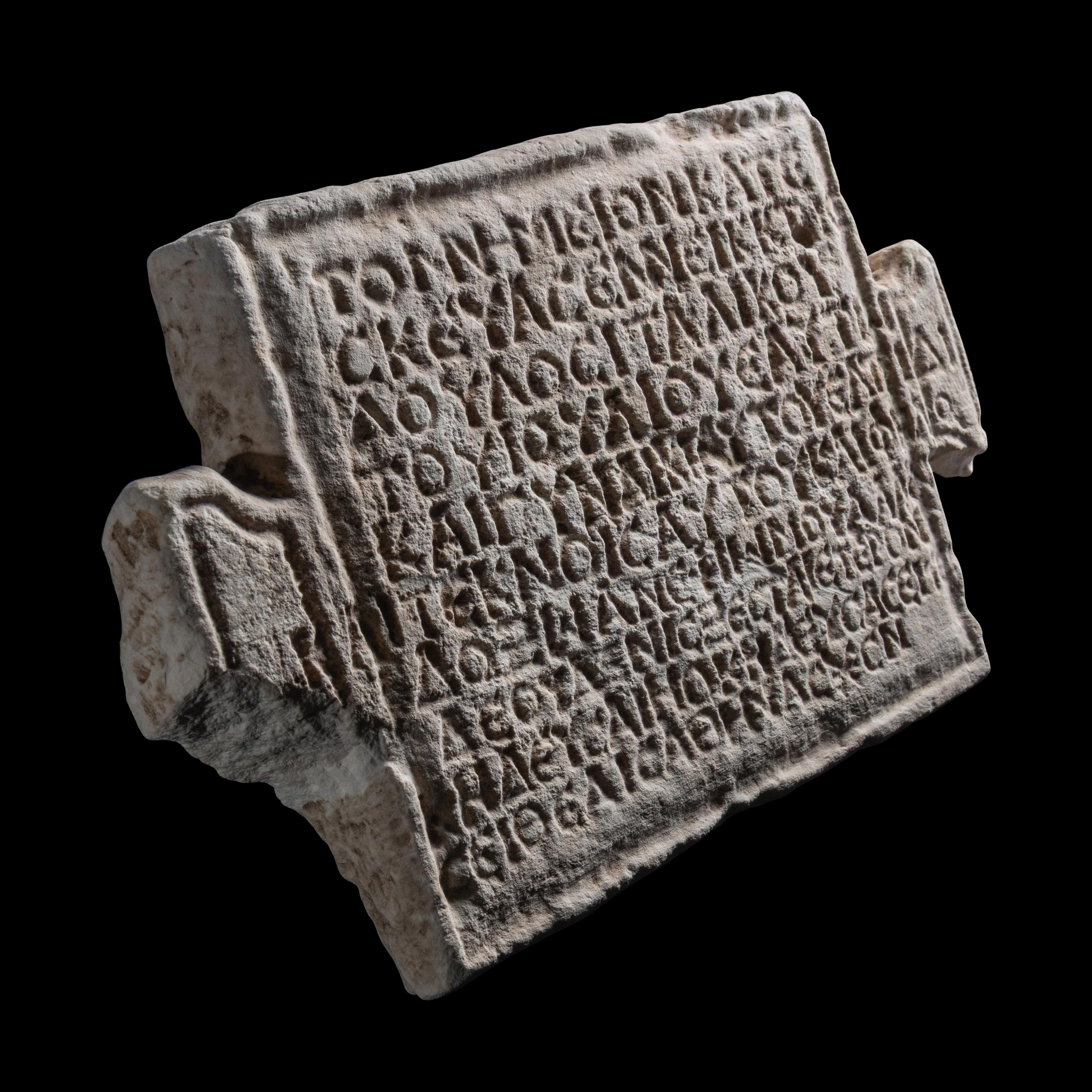 A Roman Marble Funerary Panel with Greek Inscription