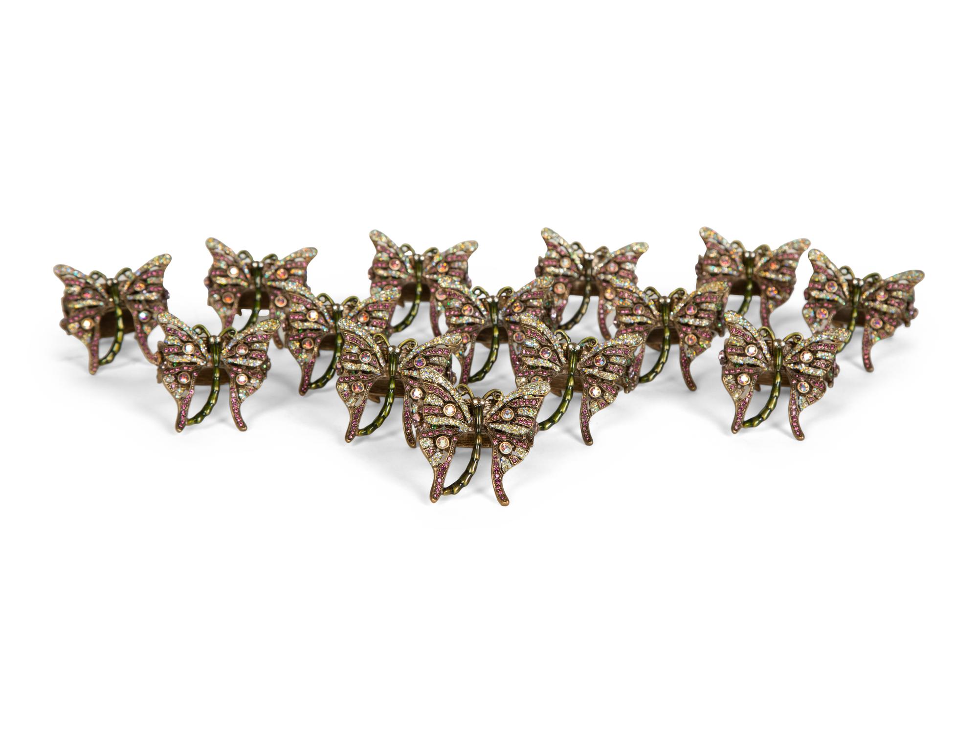 A Large Collection of Napkin Rings, Place Card Holders, and Utensil Rests