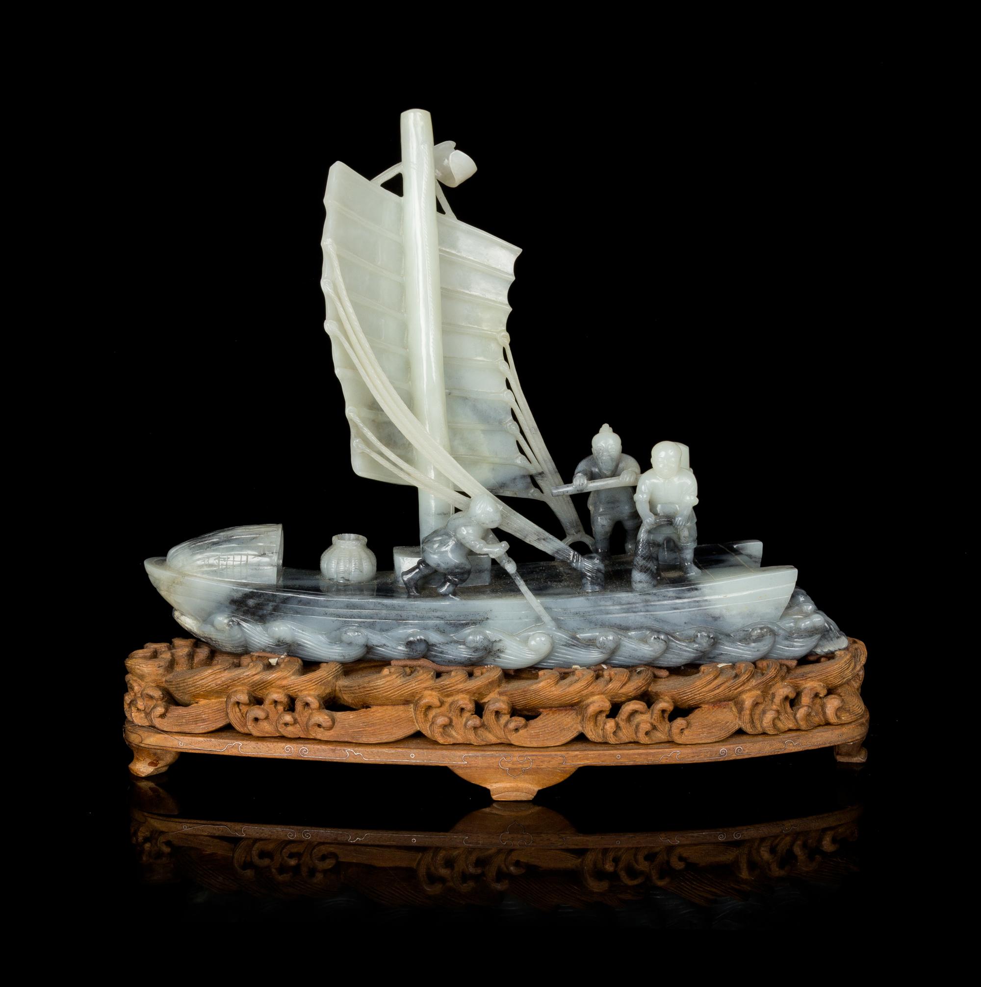 A Grey and White Jade Model of a Boat Height 9 1/2 inches. — EARLY 20TH CENTURY