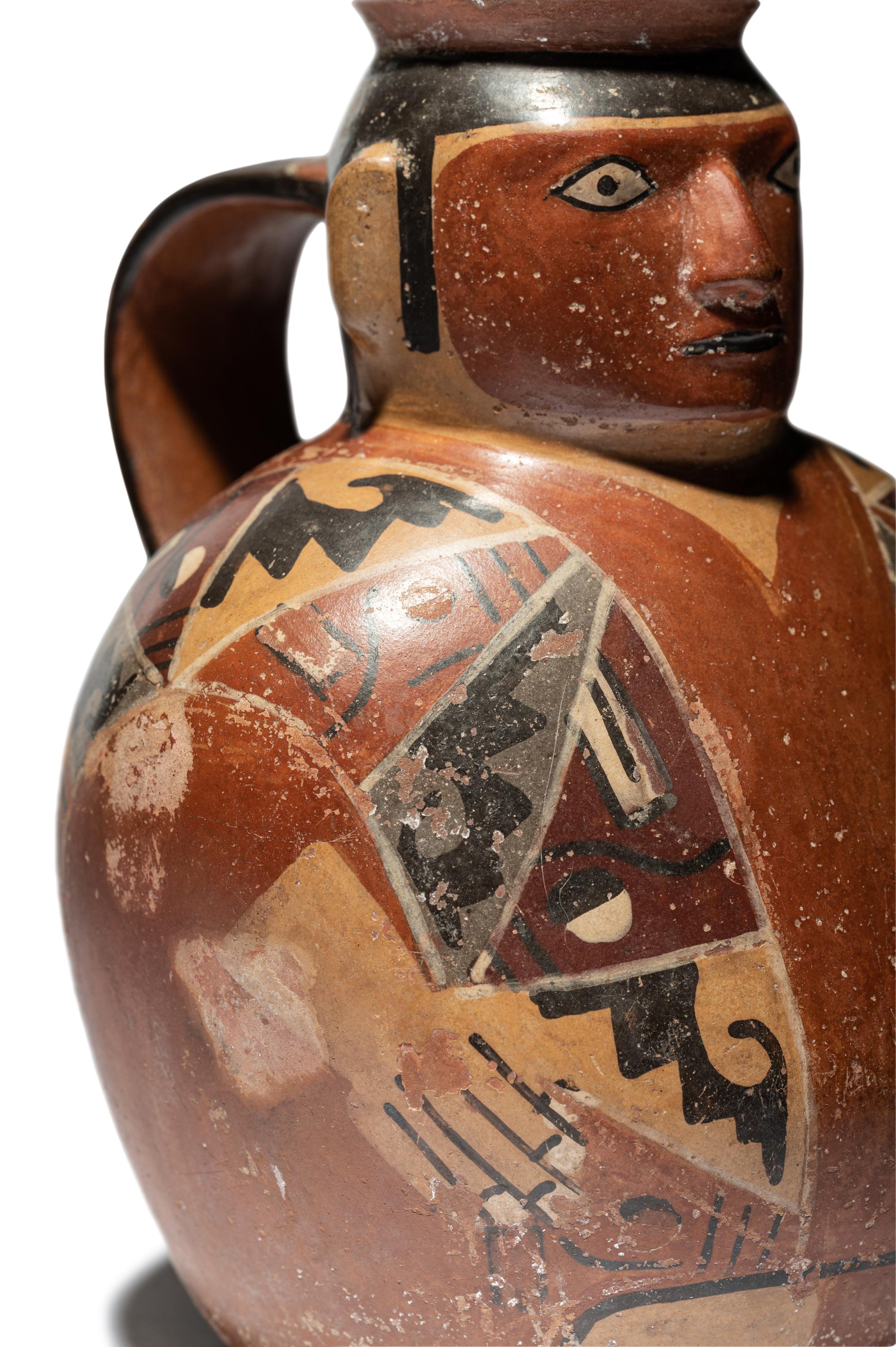 A Huari Man with Poncho Vessel