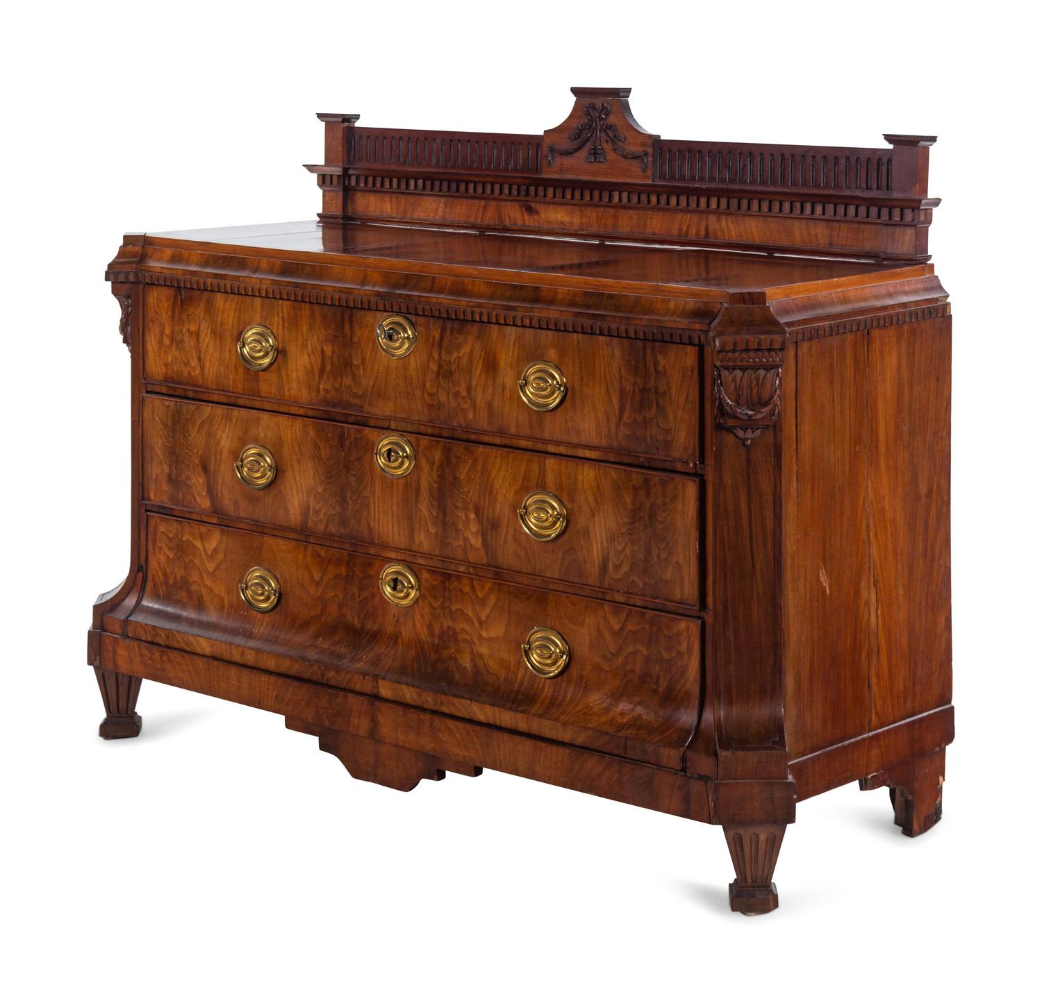 A Northern European Neoclassical Walnut Commode