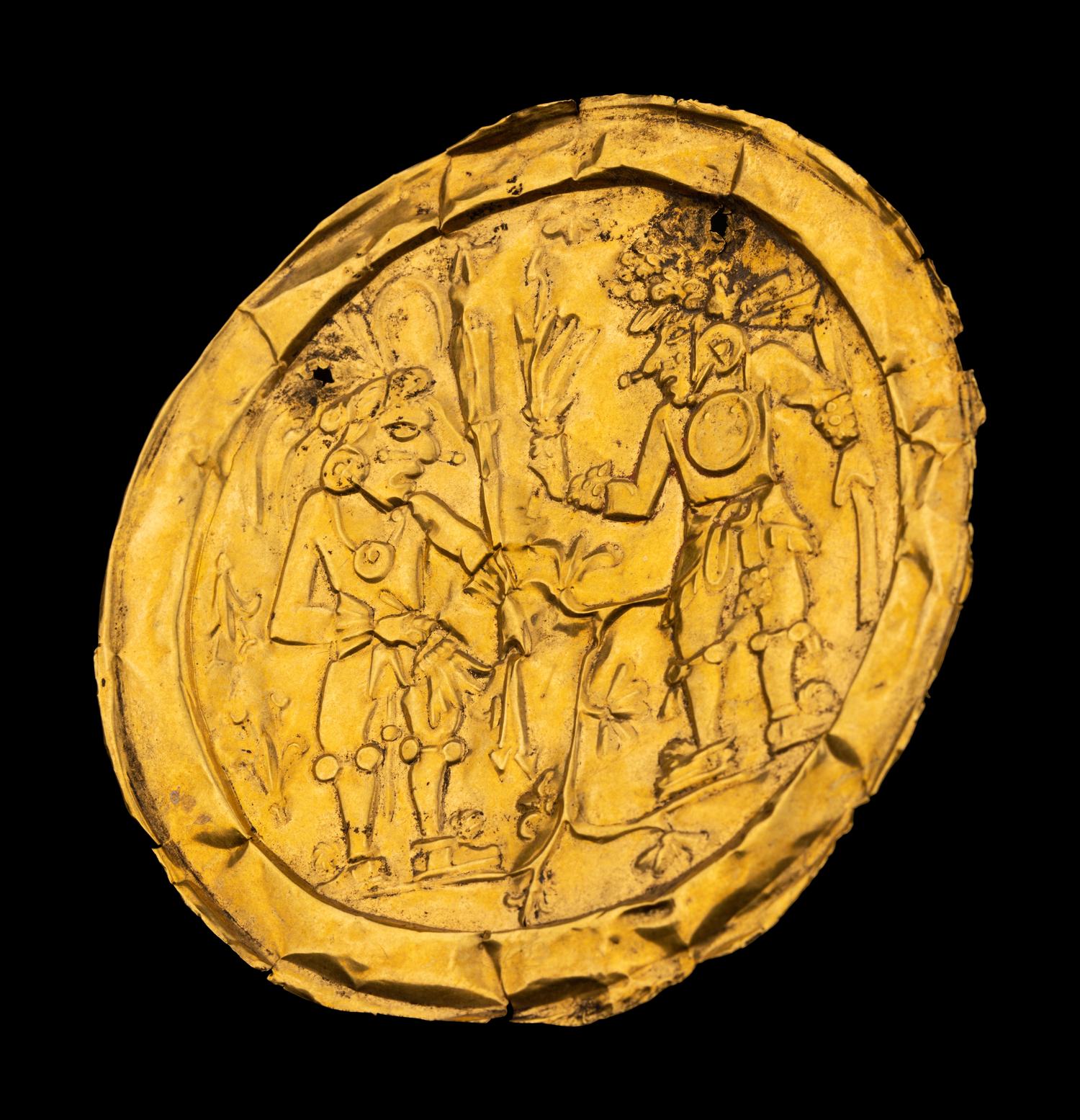 An Aztec or Toltec Gold Embossed Disc