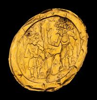 An Aztec or Toltec Gold Embossed Disc