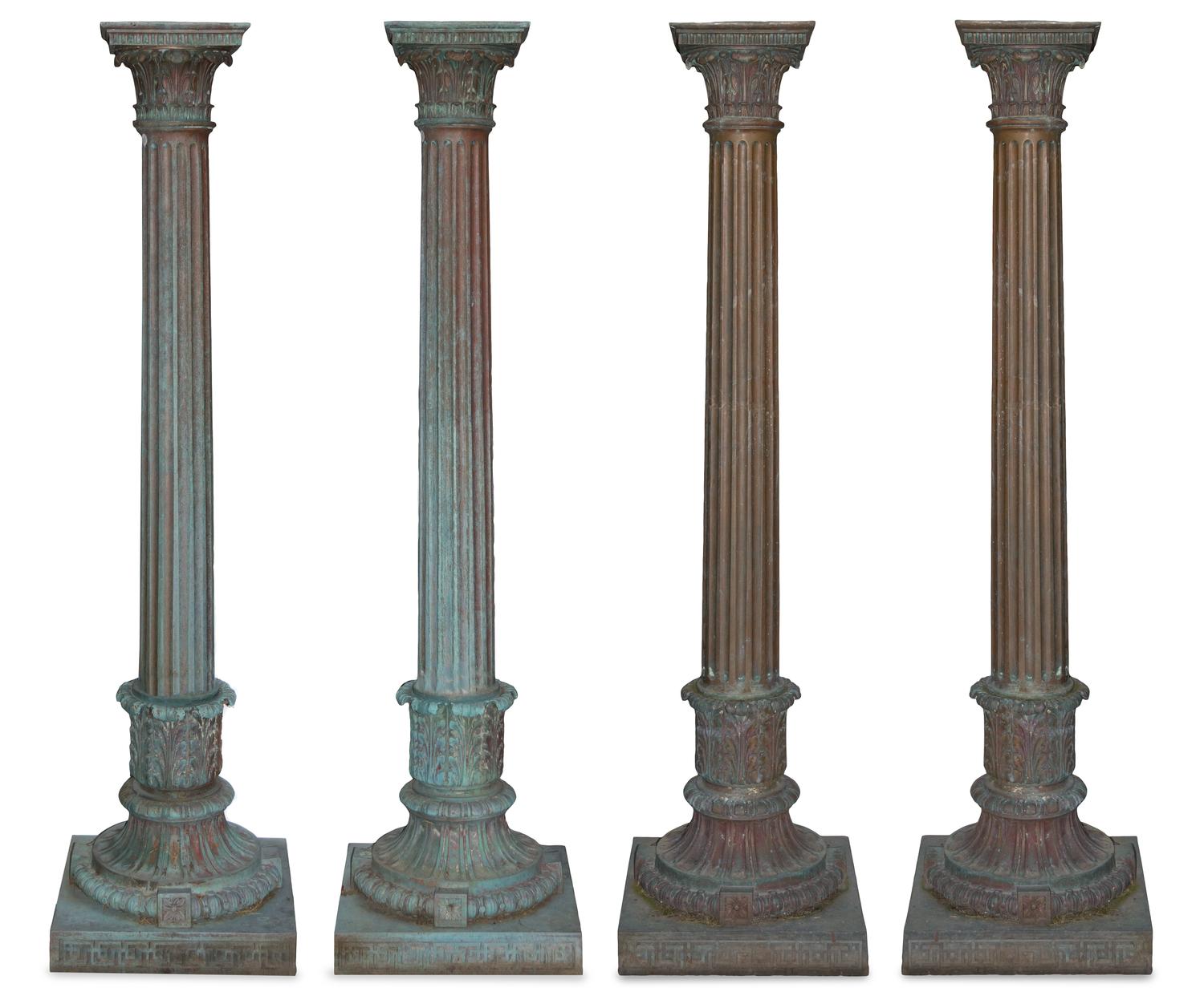 A Set of Four Patinated Bronze Garden Columns Height 81 1/2 inches.