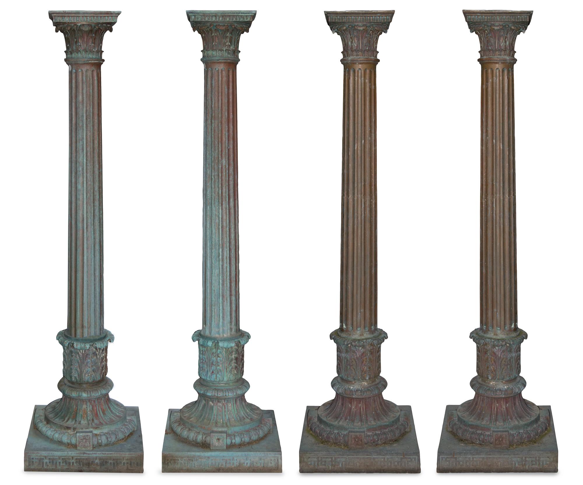 A Set of Four Patinated Bronze Garden Columns Height 81 1/2 inches.