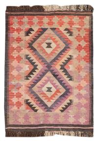 A Flat Woven Rug 3 feet 8 inches x 2 feet 7 inches.