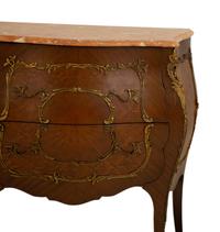 A Louis XV Style Gilt Bronze Mounted Marble Top Bombe Commode