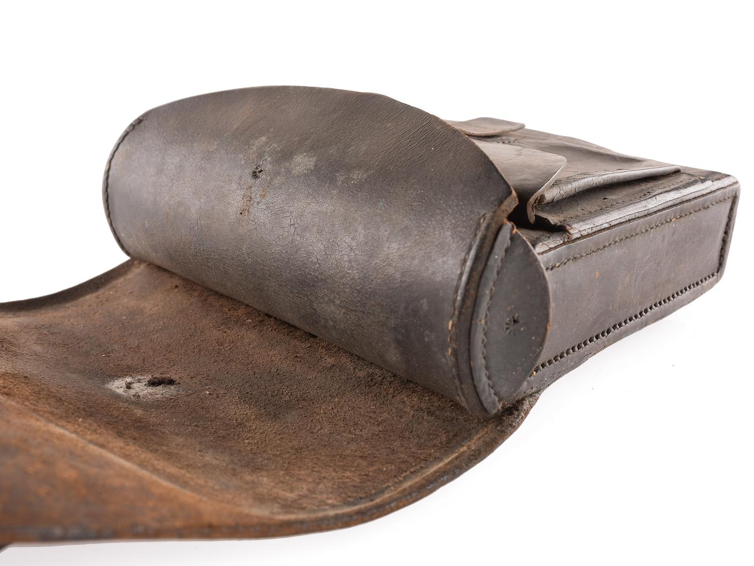 [CIVIL WAR]. A collection of items attributed to Thomas W. Johnson, Co. K, 4th Delaware Infantry, incl. frock coat, cap, belt rig, and cartridge box.