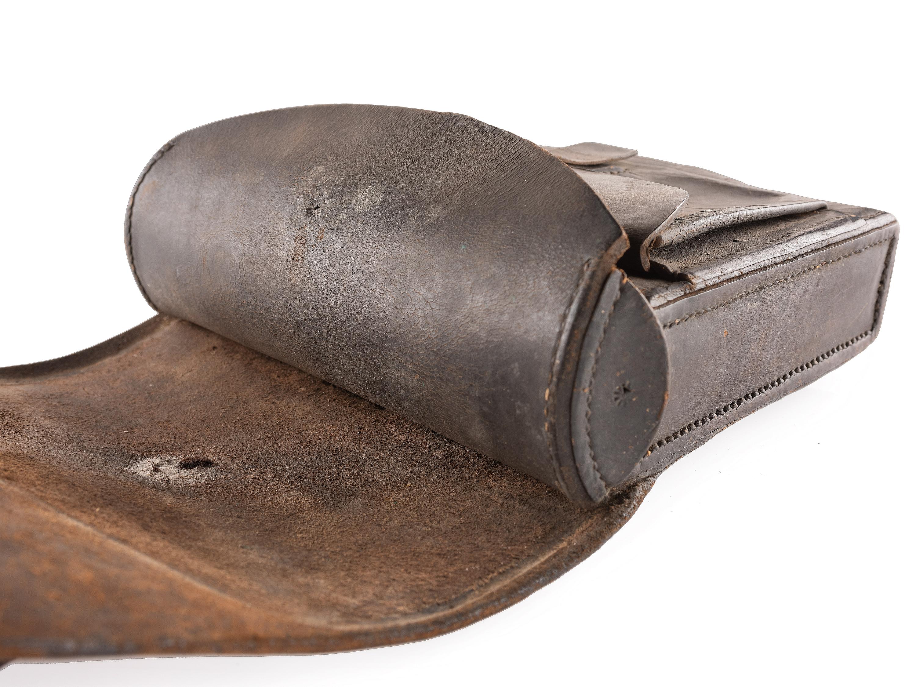 [CIVIL WAR]. A collection of items attributed to Thomas W. Johnson, Co. K, 4th Delaware Infantry, incl. frock coat, cap, belt rig, and cartridge box.