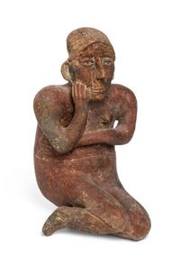 A Pre-Columbian Terracotta Figure, Colima, Height 13 1/8 inches.