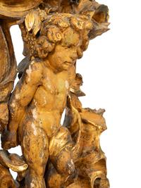 A Continental Carved, Painted and Parcel-Gilt Figural Clock