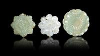 Three Celadon Jade Floriform Pendants