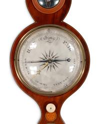 A George III Mahogany and Marquetry Wheel Barometer