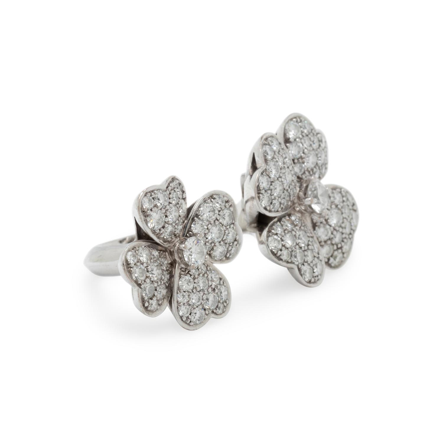 VAN CLEEF & ARPELS, DIAMOND AND WHITE GOLD 'COSMOS BETWEEN THE FINGER' RING