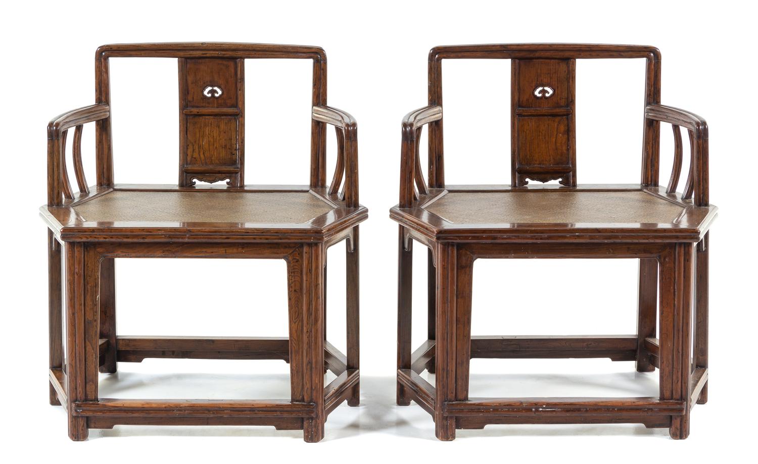 A Pair of Yumu Hexagonal Armchairs Height 33 x length 30 1/2 x width 20 1/2 inches. — QING DYNASTY (1644-1912)