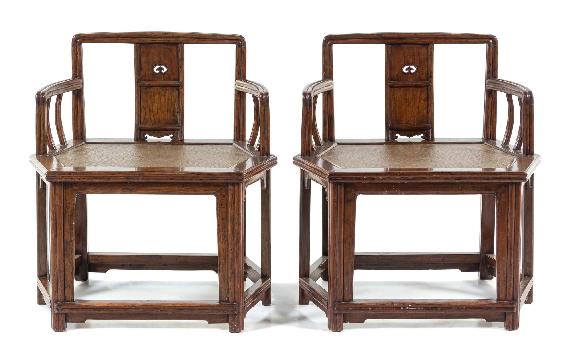 A Pair of Yumu Hexagonal Armchairs Height 33 x length 30 1/2 x width 20 1/2 inches. — QING DYNASTY (1644-1912)