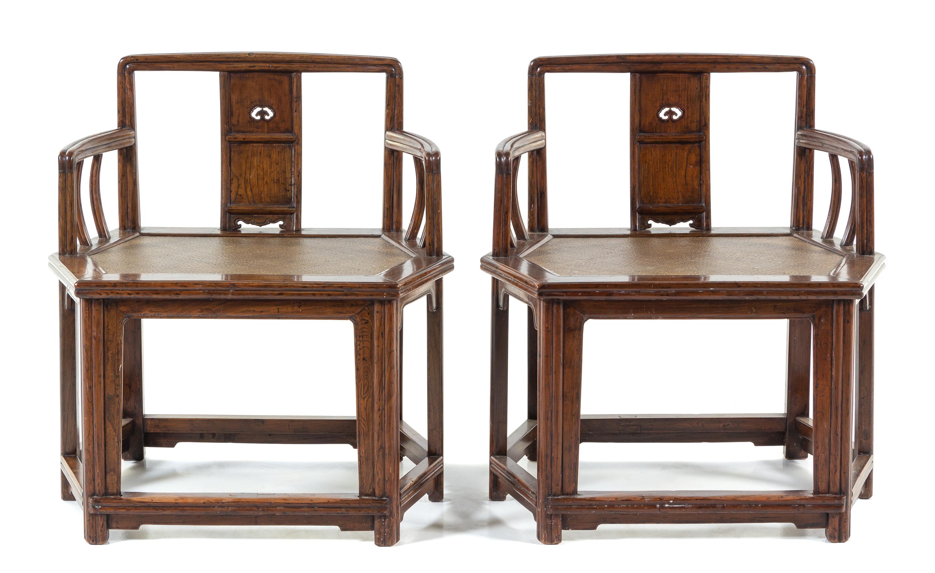 A Pair of Yumu Hexagonal Armchairs Height 33 x length 30 1/2 x width 20 1/2 inches. — QING DYNASTY (1644-1912)