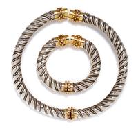 A Sterling Silver and 18 Karat Yellow Gold Demi-Parure, Zolotas, 180.80 dwts.