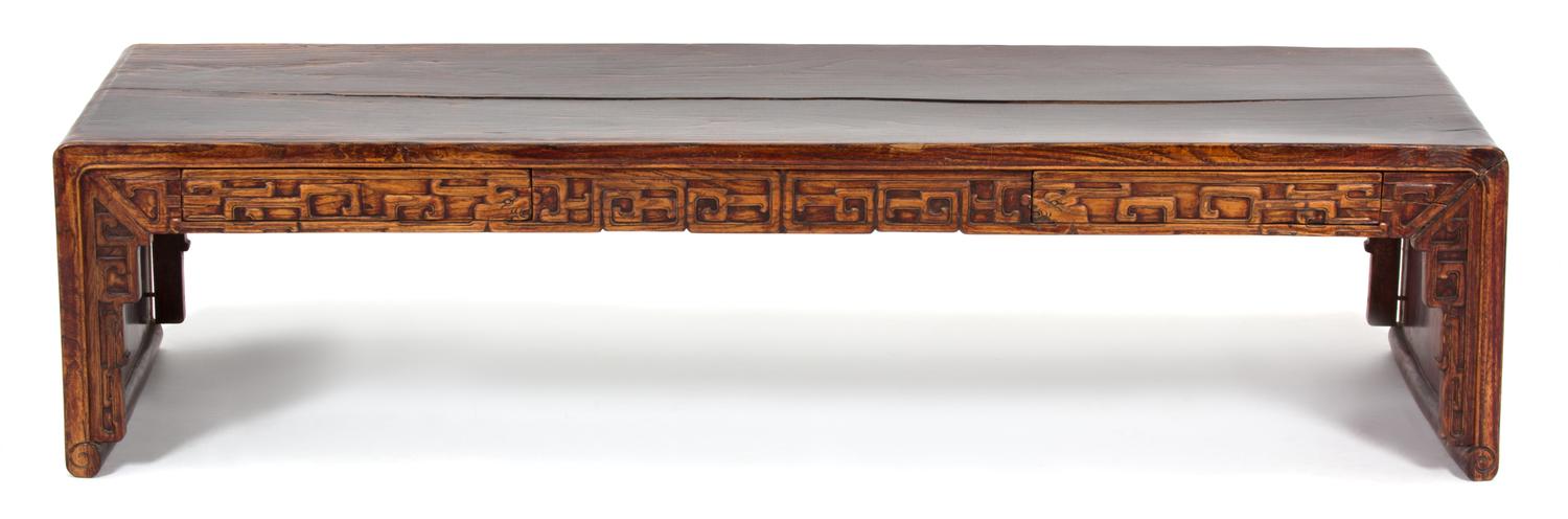 A Chinese Hardwood Bench Height 15 x width 63 x depth 19 inches.
