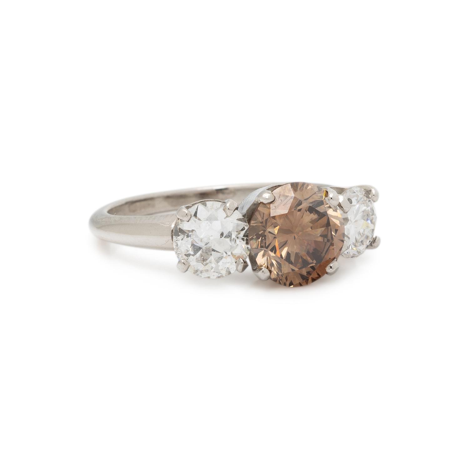 FANCY COLORED DIAMOND AND DIAMOND RING