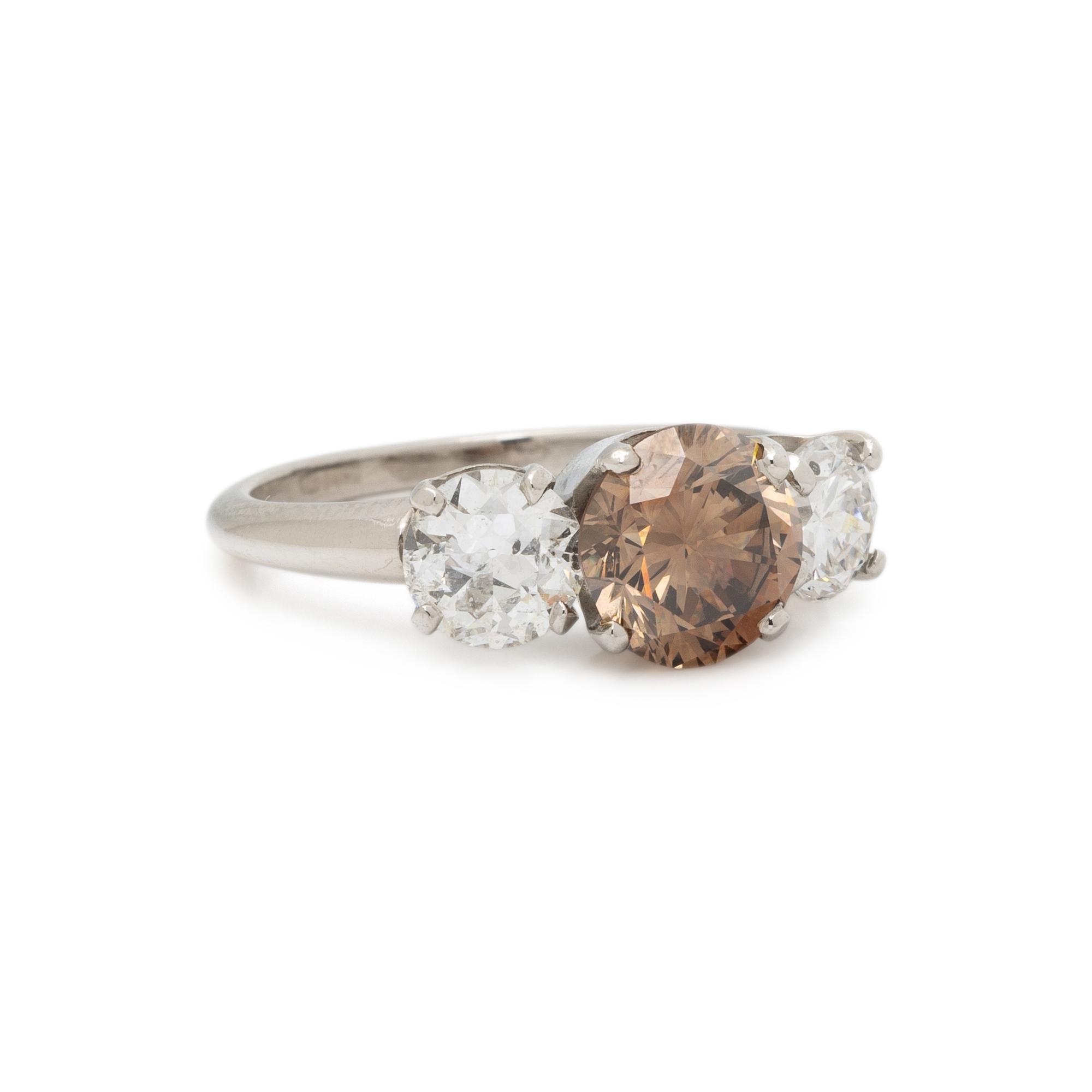 FANCY COLORED DIAMOND AND DIAMOND RING