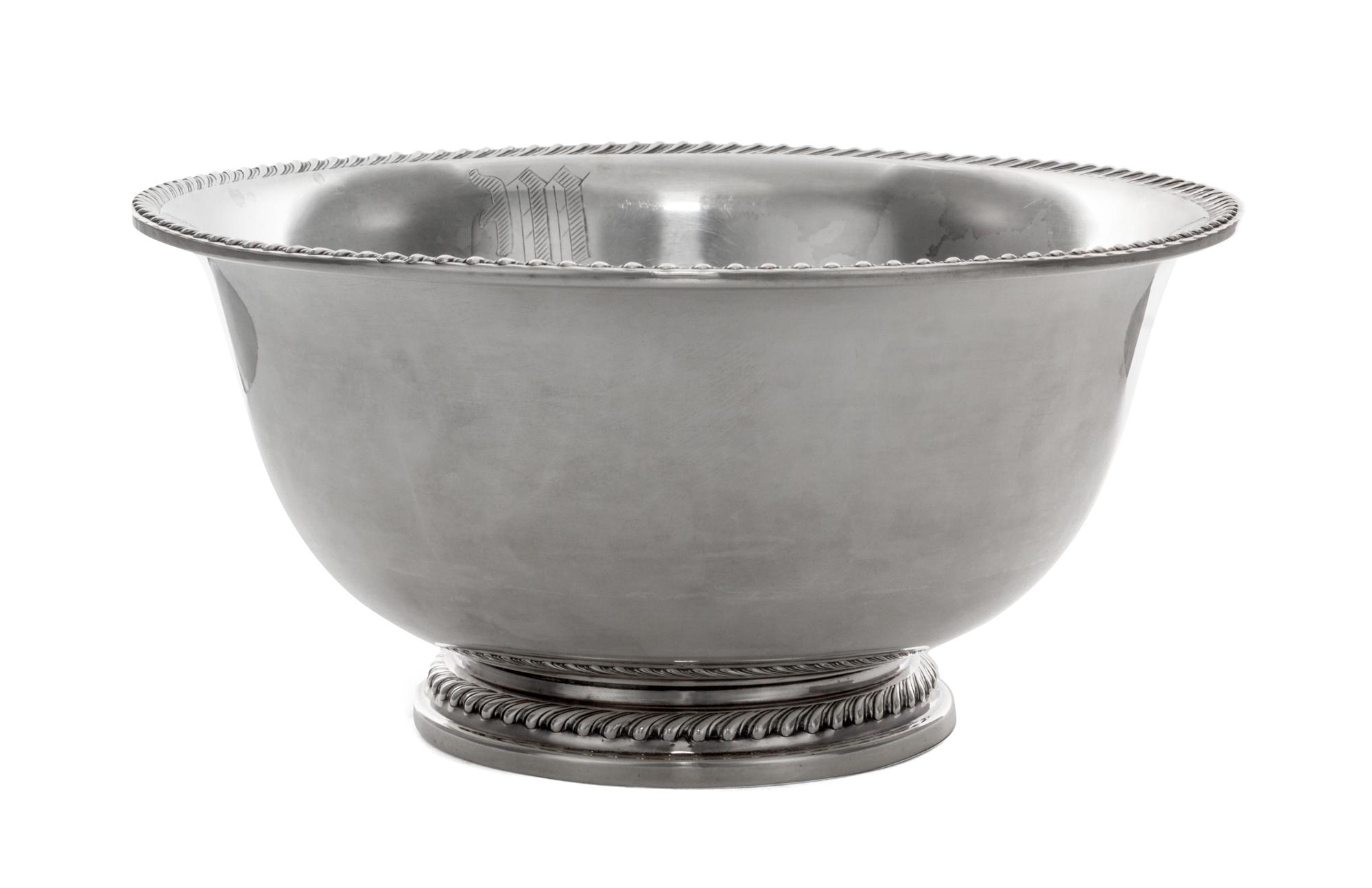 An American Silver Bowl, Openstein, of deep circular form with a flaring rim, on a short circular foot, gadrooned borders, engraved nea