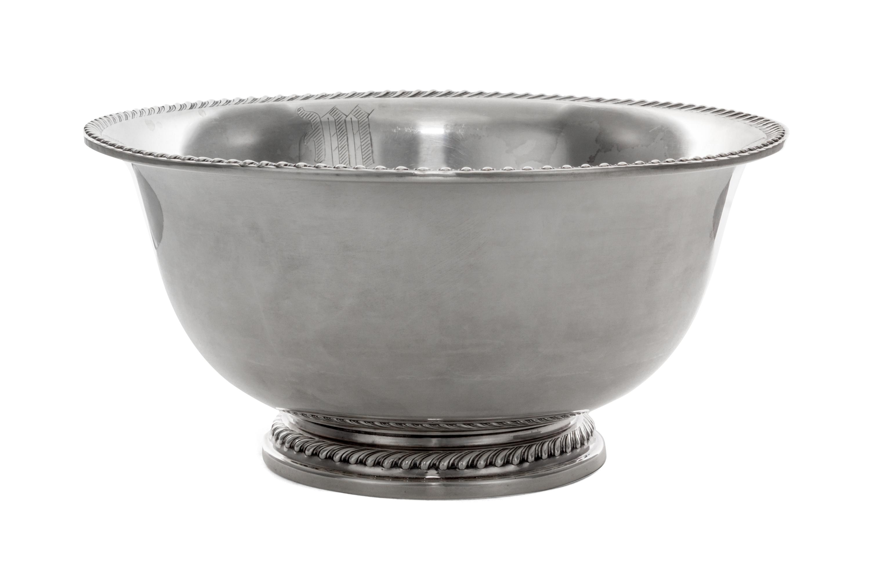 An American Silver Bowl, Openstein, of deep circular form with a flaring rim, on a short circular foot, gadrooned borders, engraved nea