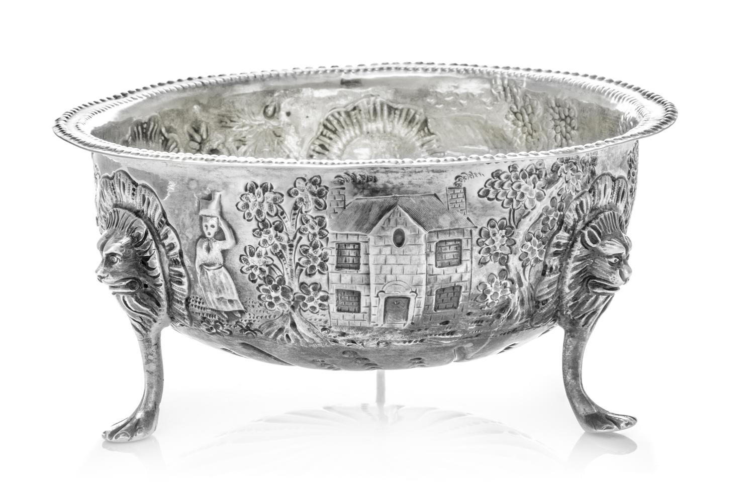 An Irish Victorian Silver Sugar Bowl, John Shields, Dublin, 1893, the beaded rim above the body having repousse pastoral scenes and a v