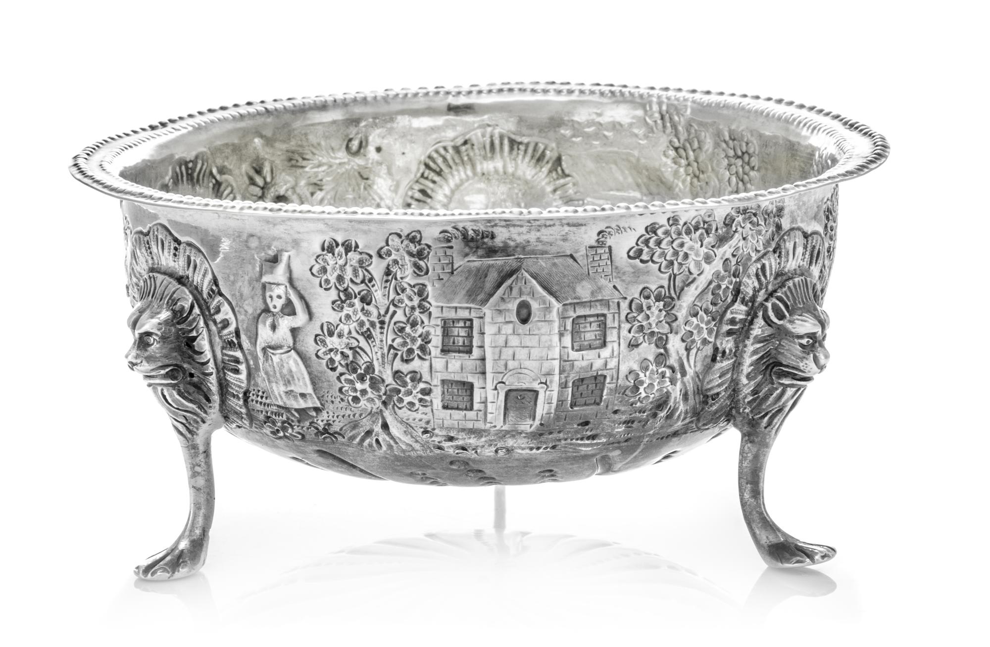 An Irish Victorian Silver Sugar Bowl, John Shields, Dublin, 1893, the beaded rim above the body having repousse pastoral scenes and a v