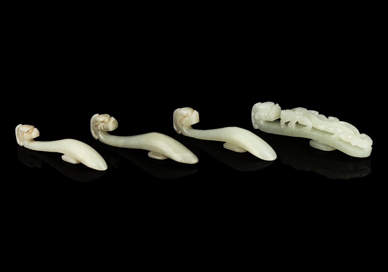 Four Chinese Celadon Jade 'Chilong' Belt Hooks