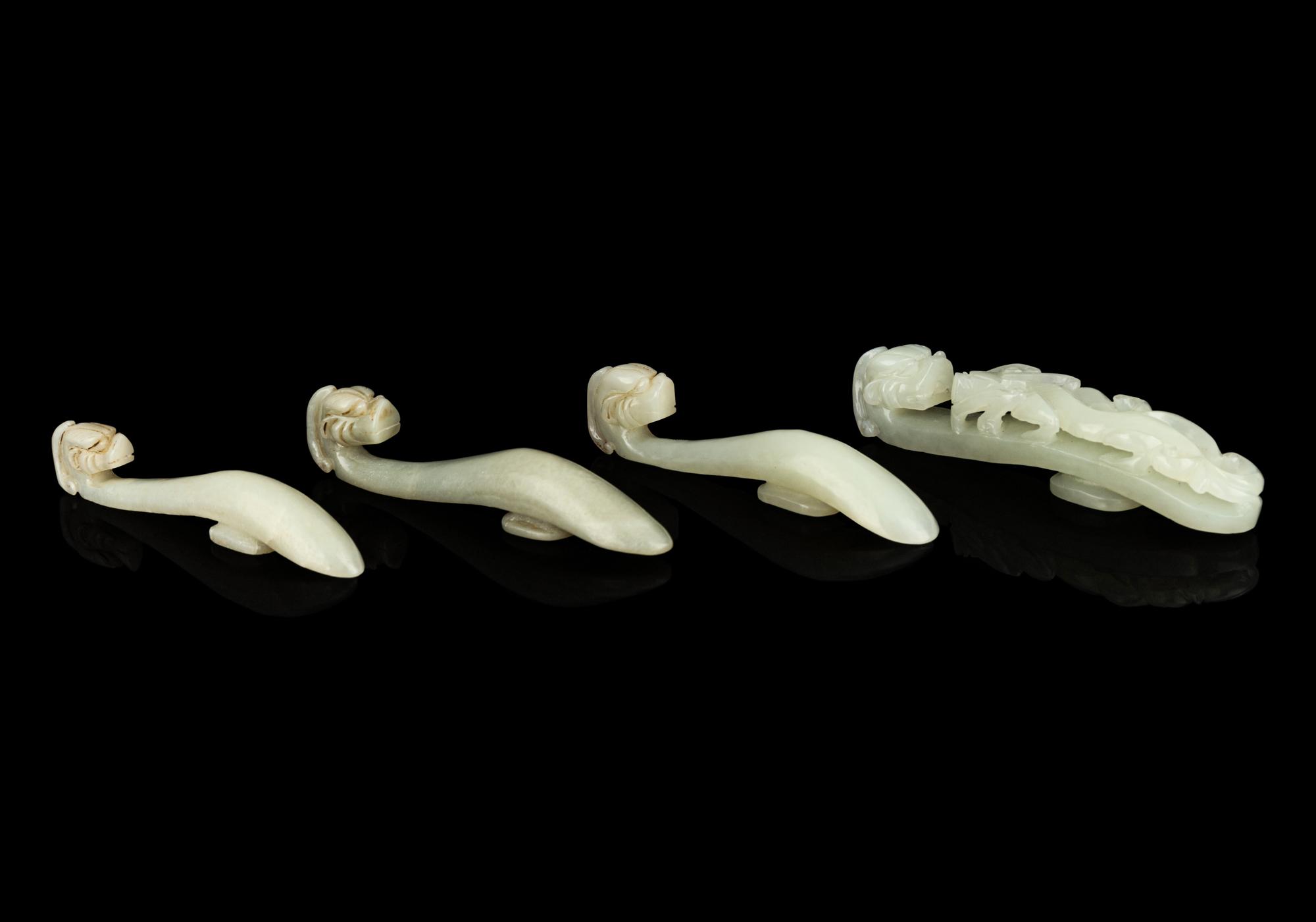 Four Chinese Celadon Jade 'Chilong' Belt Hooks