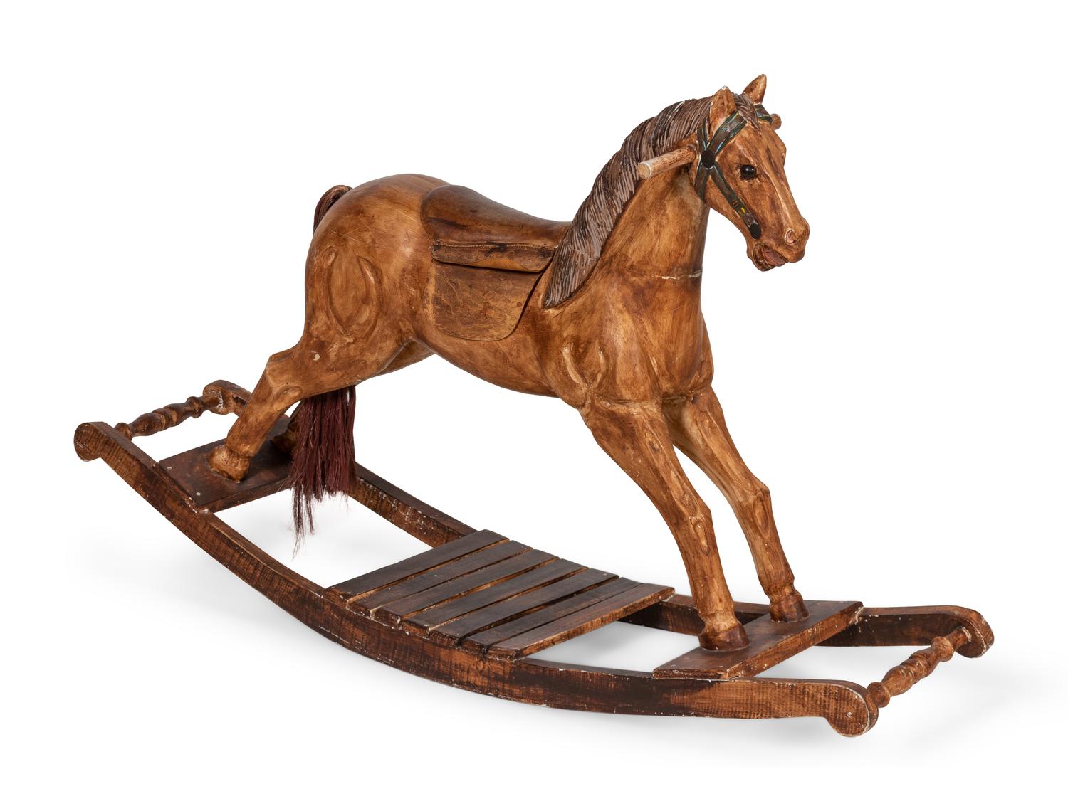 A Paint Decorated Rocking Horse and a Carved Rocking Horse