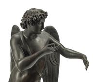 A French Patinated Bronze Figure of Cupid