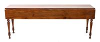 An American Cherry Double-Drop Leaf Table Height 27 3/4 x length 78 x depth 17 1/2 inches