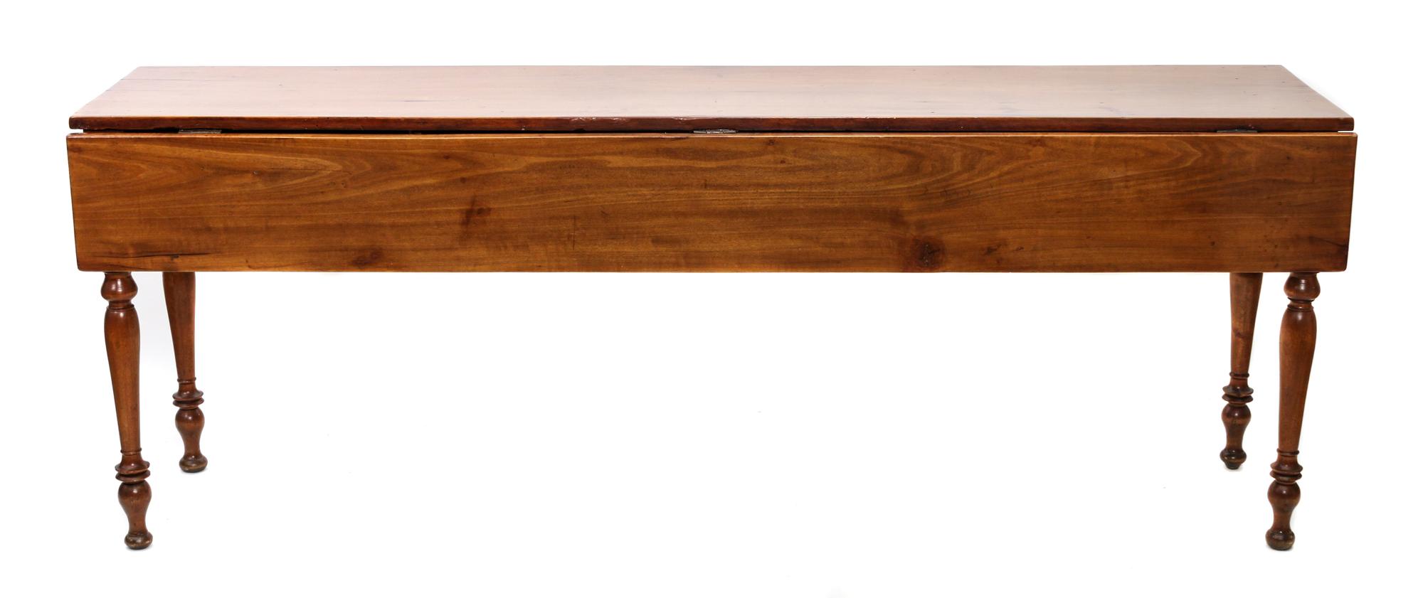 An American Cherry Double-Drop Leaf Table Height 27 3/4 x length 78 x depth 17 1/2 inches