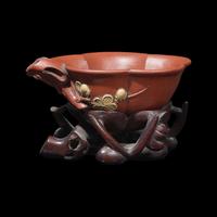 A Rare Yixing 'Prunus Blossom' Coupe with Impressed Seal 'Mingyuan', and Wood Stand 陳鳴遠款朱泥紫砂梅花杯