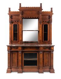 A Victorian Walnut Marble-Top Cabinet