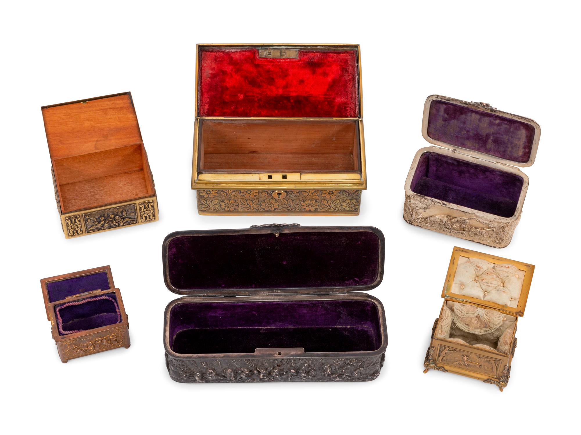 Six Continental Cast Metal Table Caskets