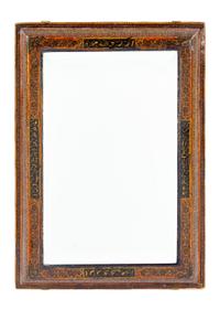 A Qajar Hand Carved and Lacquered Mirror