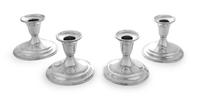 A Set Four American Silver Candlesticks, A. T. Gunner & Co., Attleboro, MA, having a tapering cup surmounting a trumpet base, weighted.