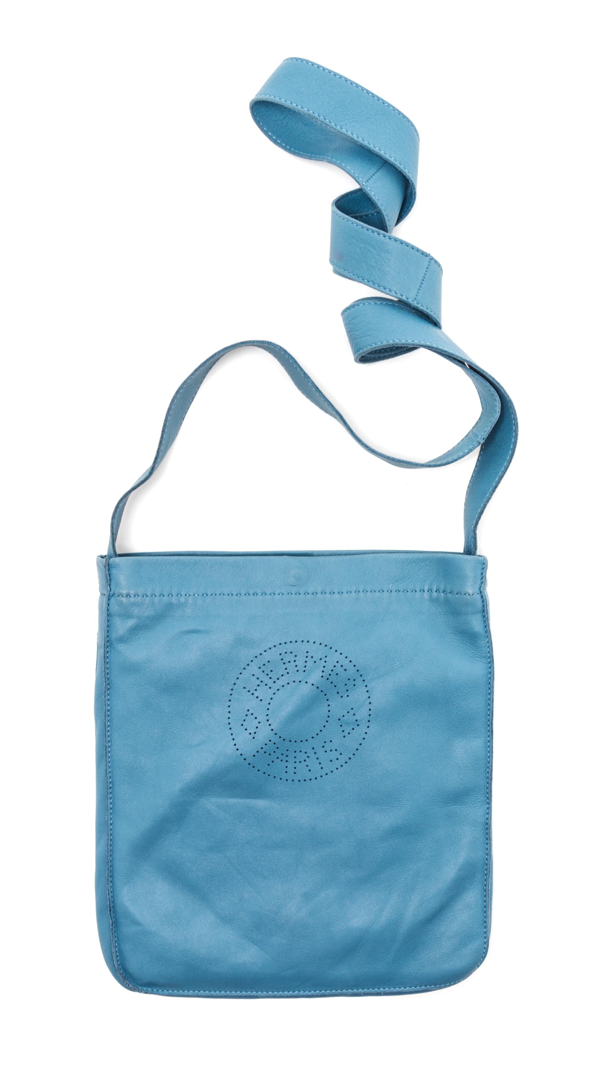An Hermes Bleu Lin Agneau Clou de Selle Pouch, 6" x 9" x 1".