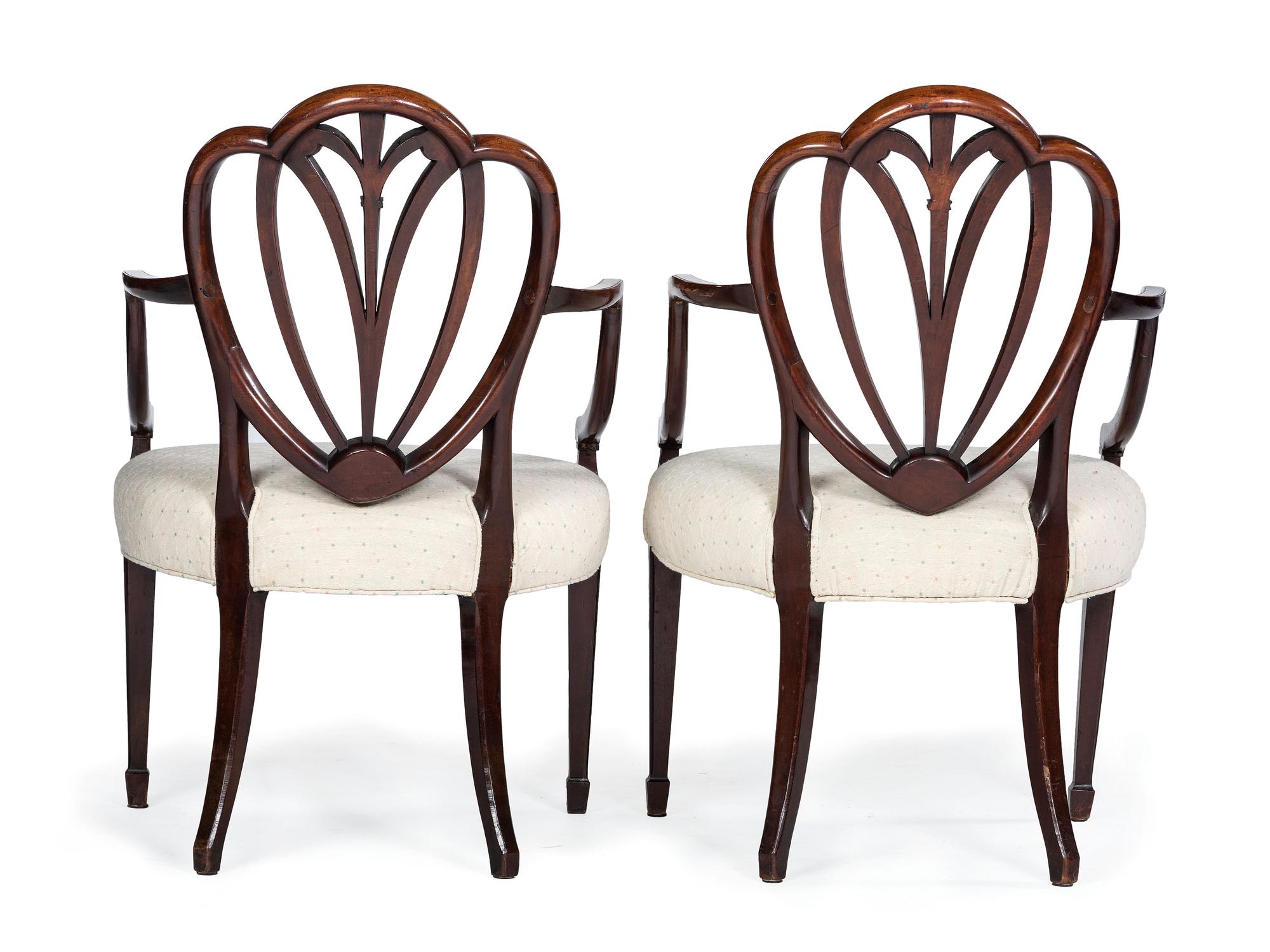 Four George III Mahogany Armchairs