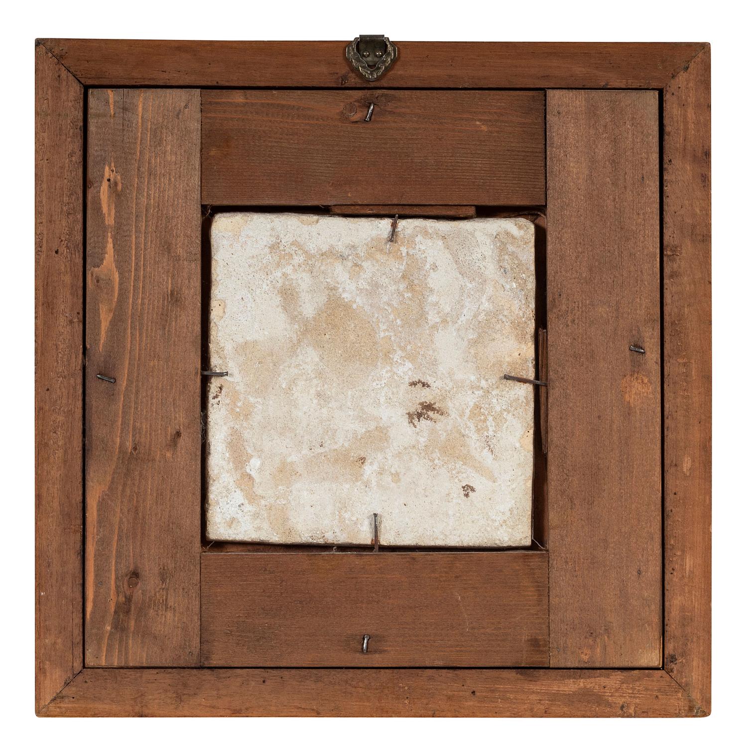 A Set of Five Framed Puce Delft Tiles