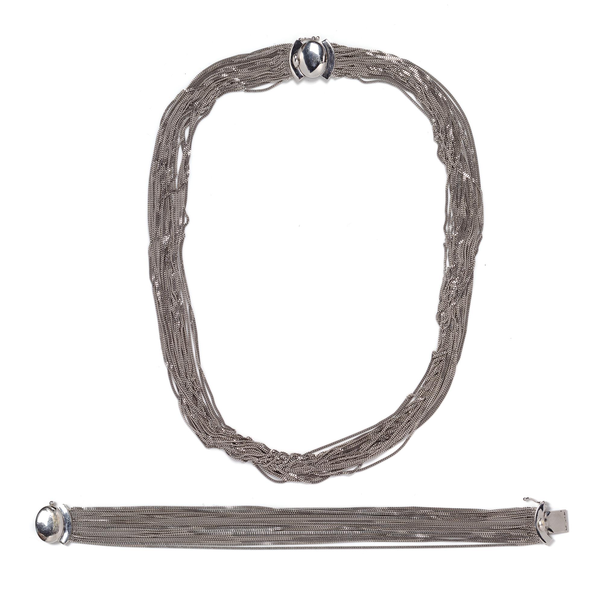 An 18 Karat White Gold Multi Chain Necklace and Bracelet, 47.60 dwts.