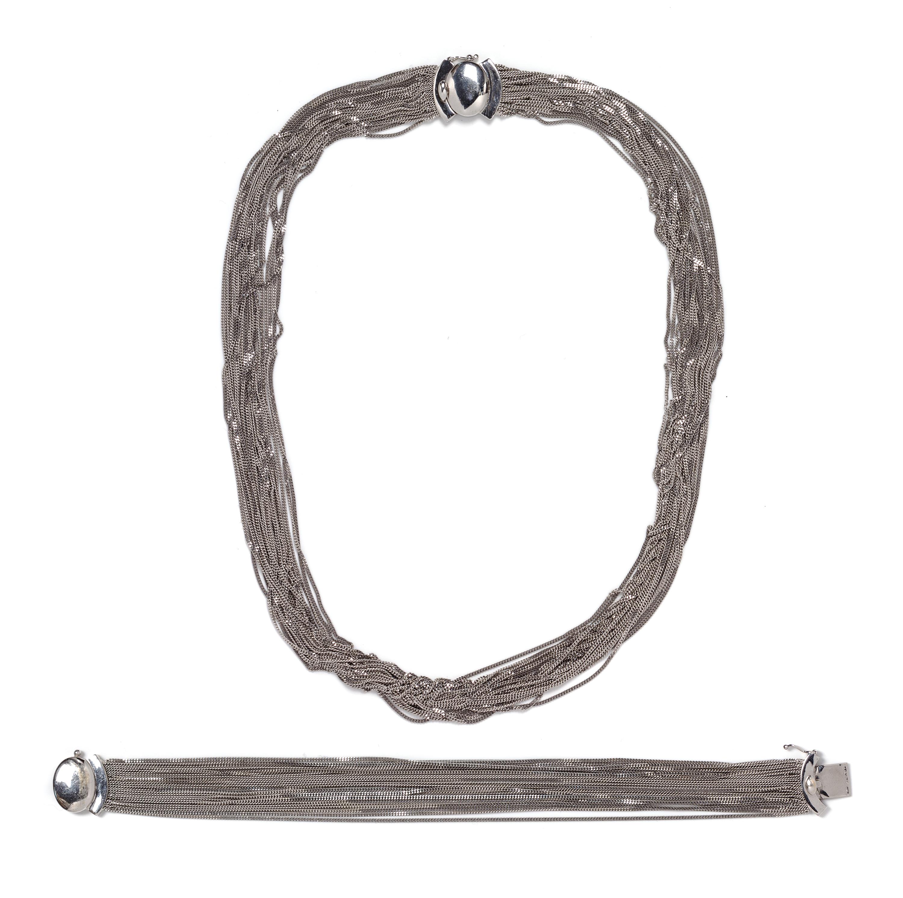 An 18 Karat White Gold Multi Chain Necklace and Bracelet, 47.60 dwts.