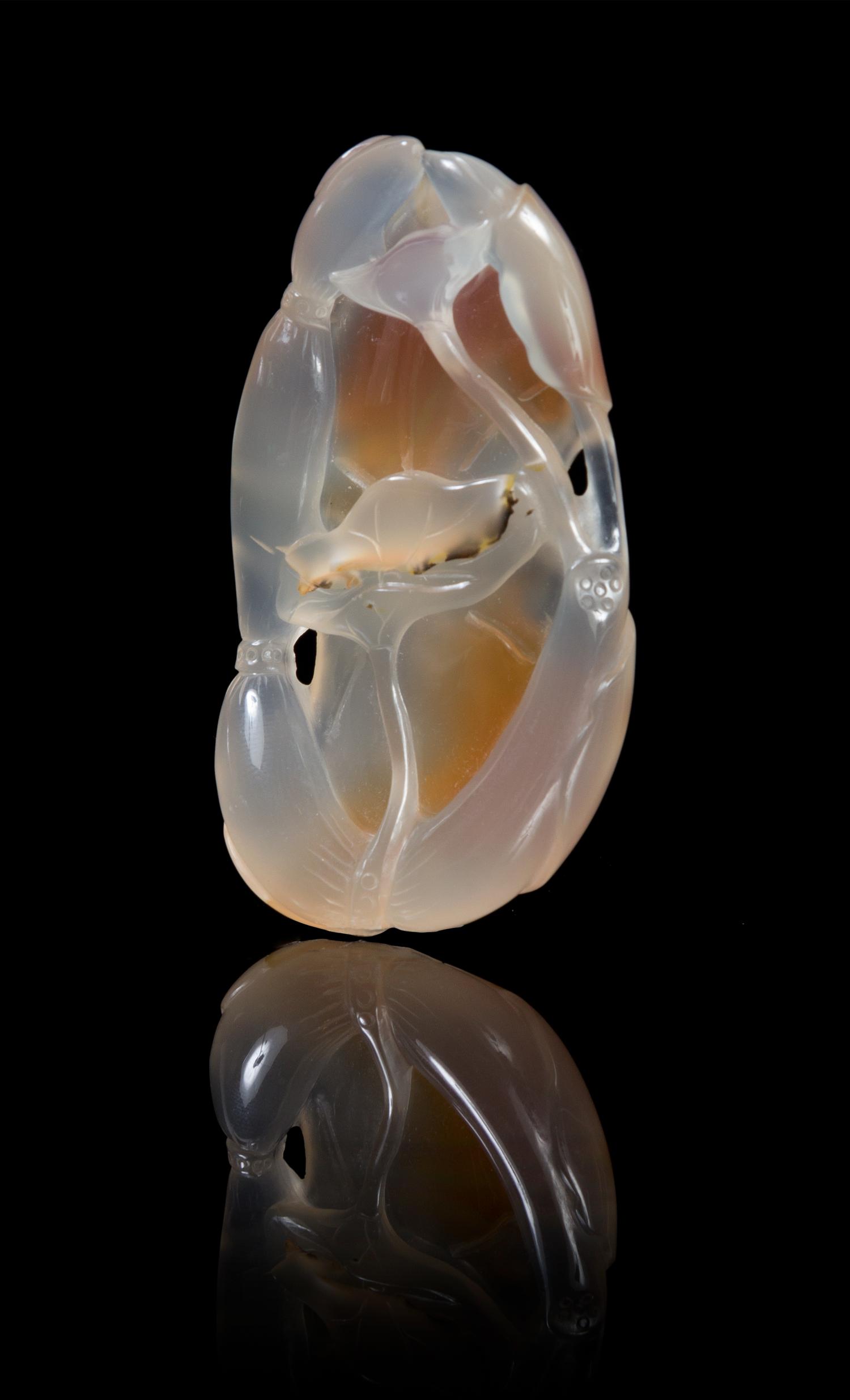 A Carved Agate Toggle Height 2 1/2 inches.