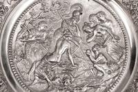 A Pair of Victorian Silverplated Mythological Circular Chargers